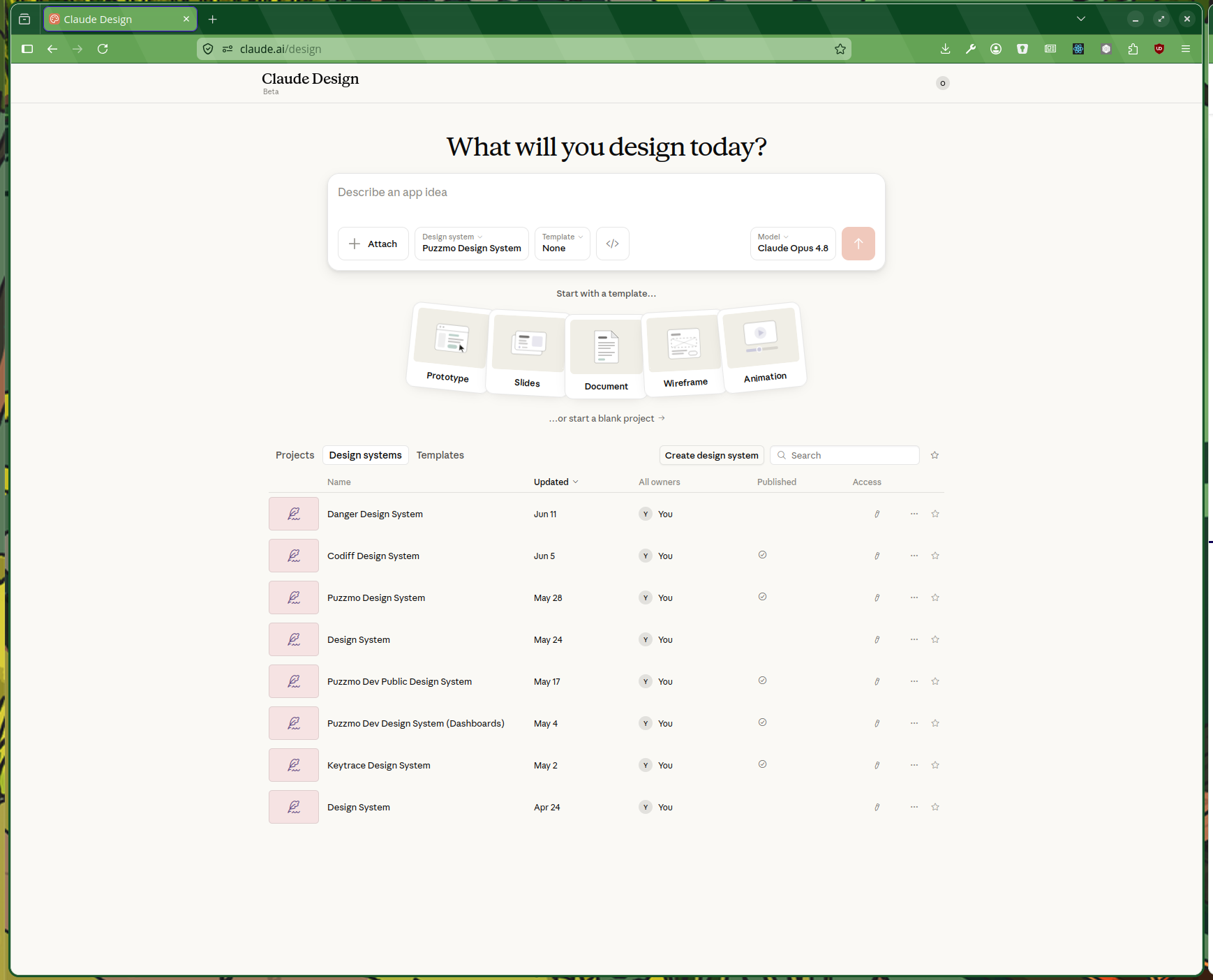 The Claude Design (Beta) home screen at claude.ai/design, headed &ldquo;What will you design today?&rdquo;. A prompt box invites you to describe an app idea using the Puzzmo Design System with Claude Opus 4.8, above template options (Prototype, Slides, Document, Wireframe, Animation) and a list of saved design systems including Danger, Codiff, Puzzmo and Keytrace design systems.